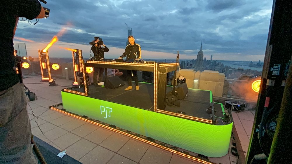 LED-wrapped broadcast riser on a rooftop