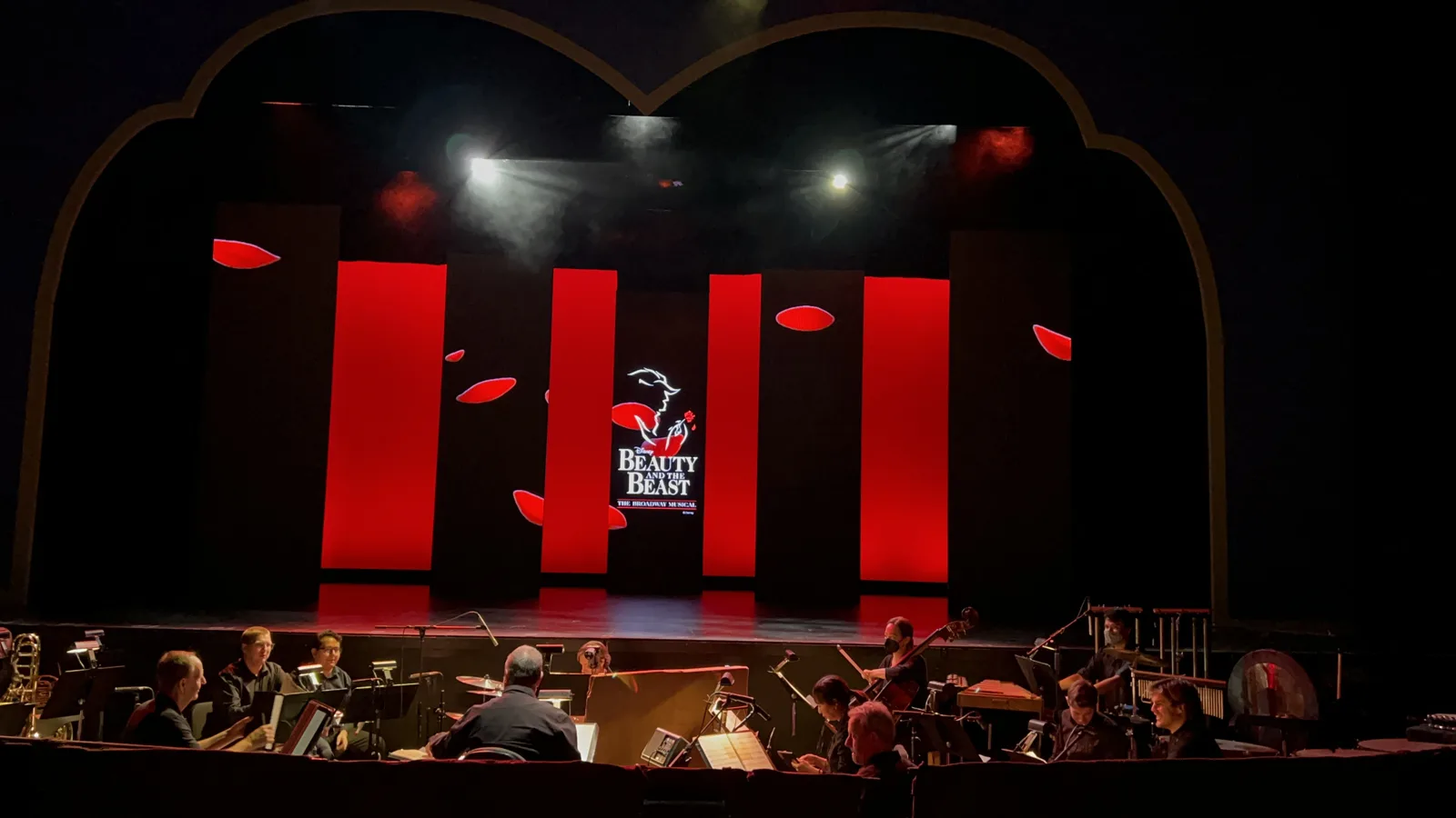 Rose-petal finale on LED columns, Beauty and the Beast
