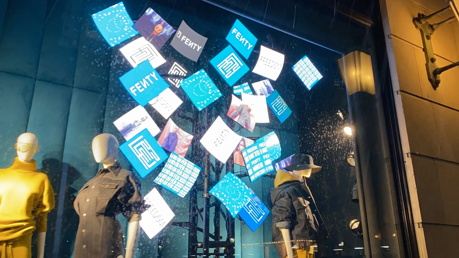 Floating LED squares in a Bergdorf Goodman window