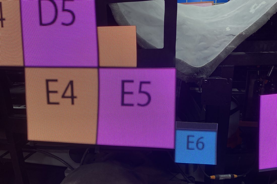 Bicep and Quadricep panels tiled together as one continuous LED canvas