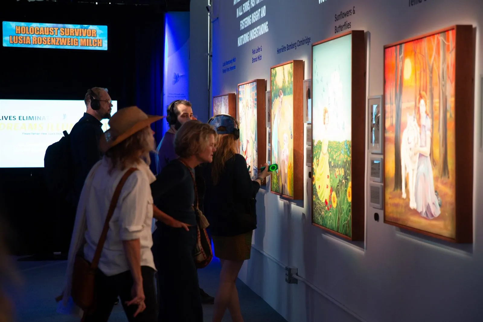 Visitors inside an immersive gallery exhibit