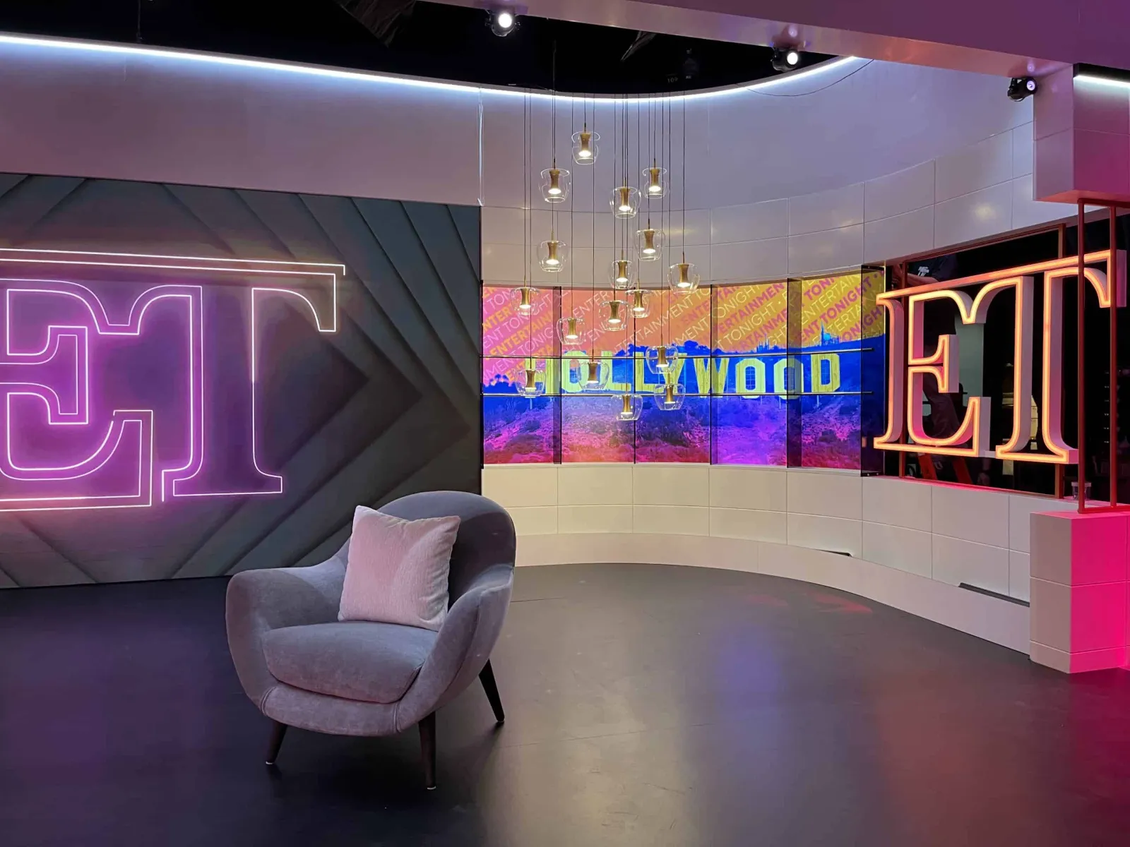 Curved LED wall on a broadcast set, built from WunderArt Agility LED