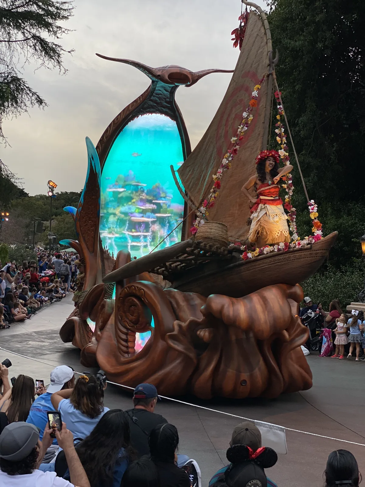 Moana parade float with glowing LED sail at Disneyland